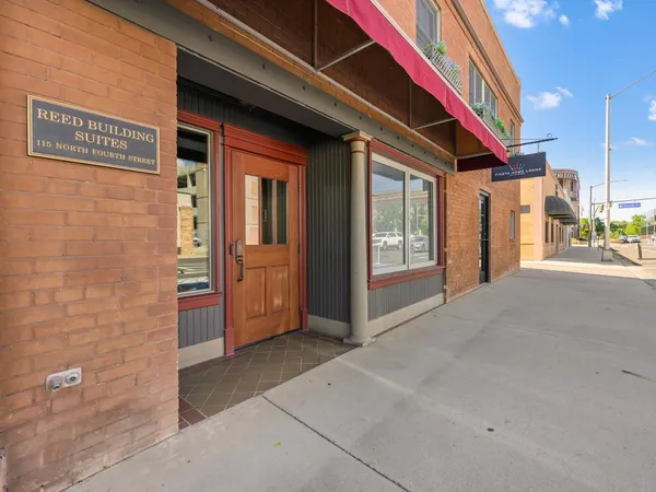 a view of a city with tall buildings