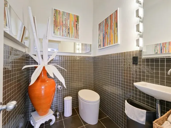 a bathroom with a toilet and a sink