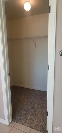an empty room with closet