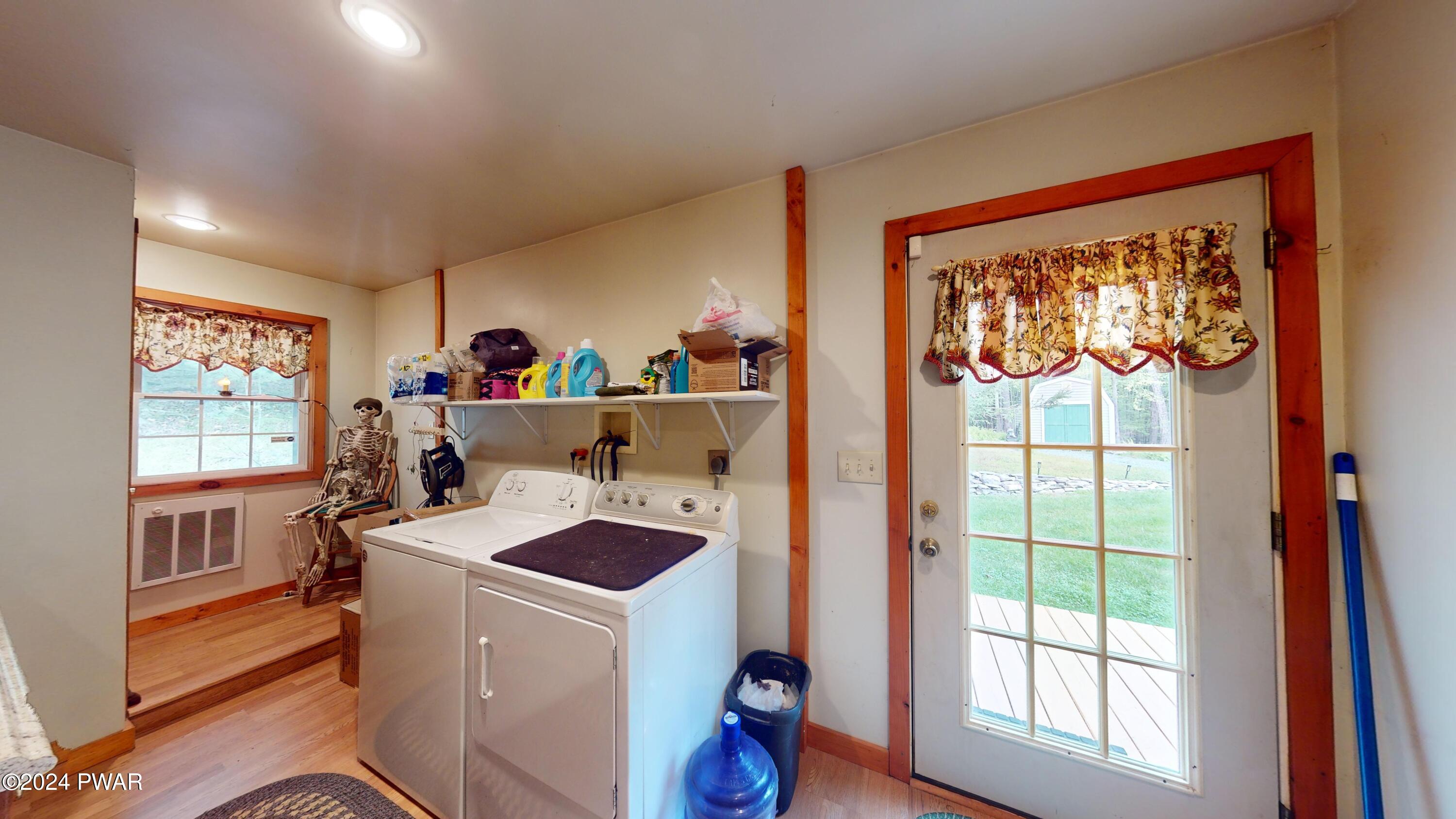 644 Raymondskill Road Milford, PA 18337 - Photo 33 of 65 Laundry w/ door to back yard