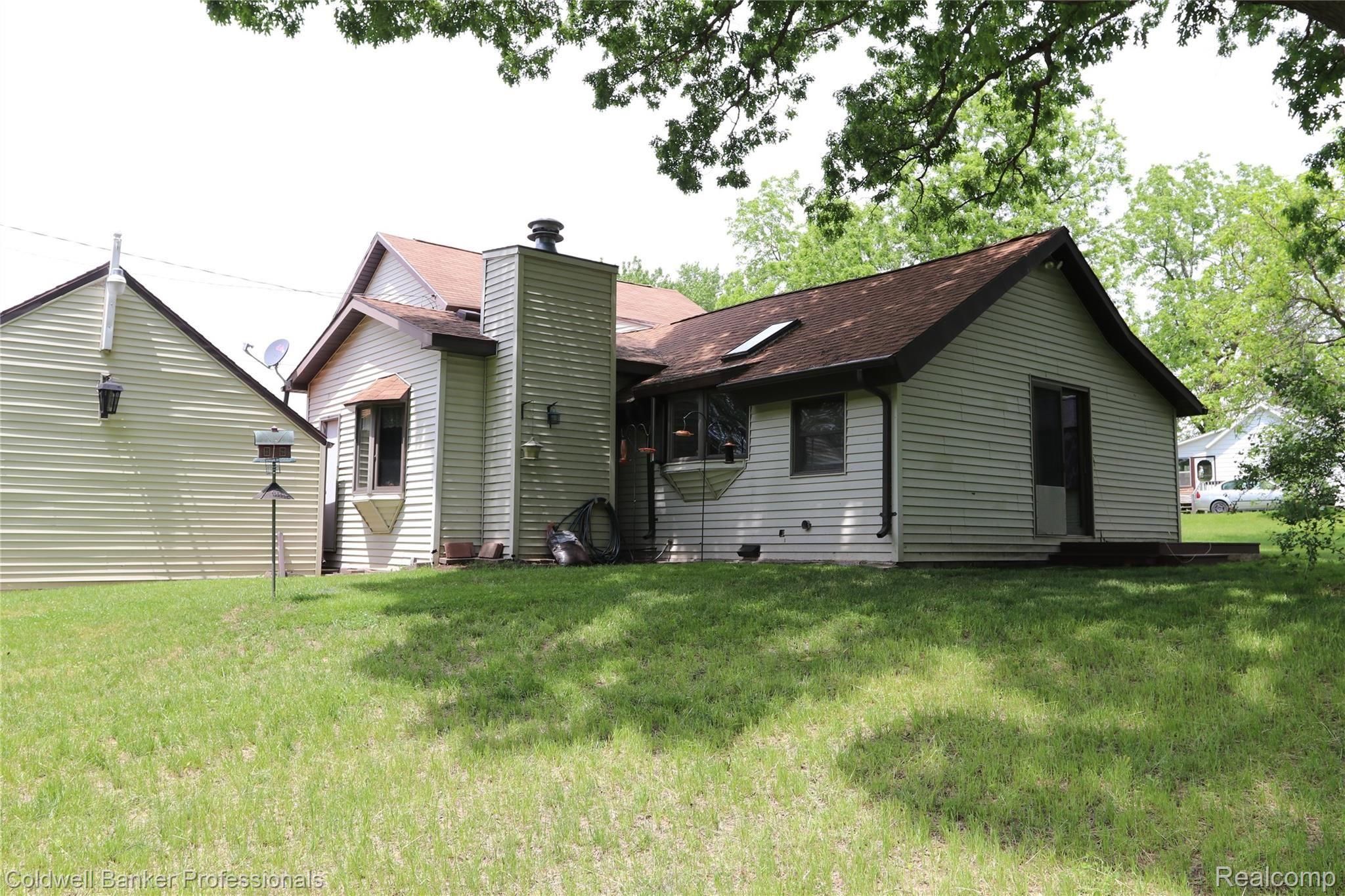 13121 Shaftsburg Road Perry, MI 48872 - Photo 40 of 41 37 13121 back.JPG