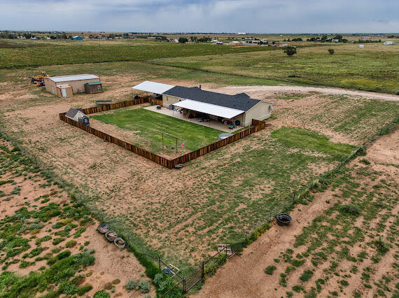 6341 Farm Private Road Levelland, TX 79336 - Photo 41 of 46 a view of a swimming pool and an outdoor seating