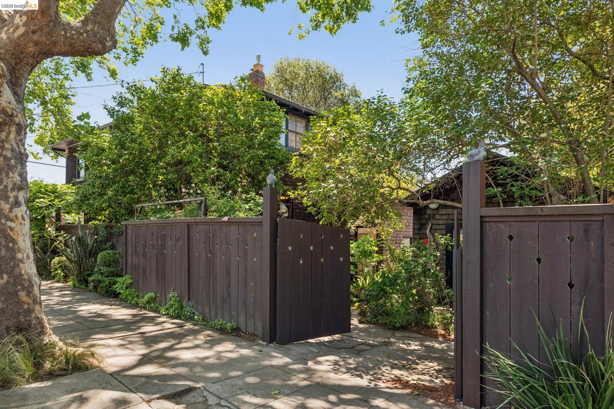 1490 Arch Street Berkeley, CA 94708 - Photo 56 of 57 front view of a house with a tree