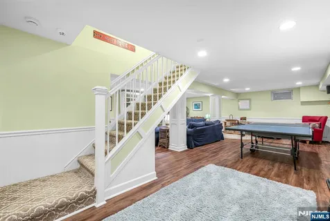 a room with furniture and wooden floors