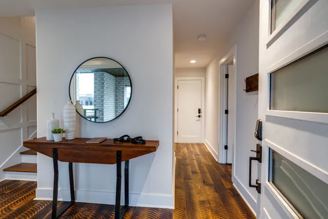 a view of a roof deck with wooden floor