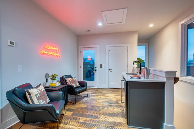 a living room with furniture and window