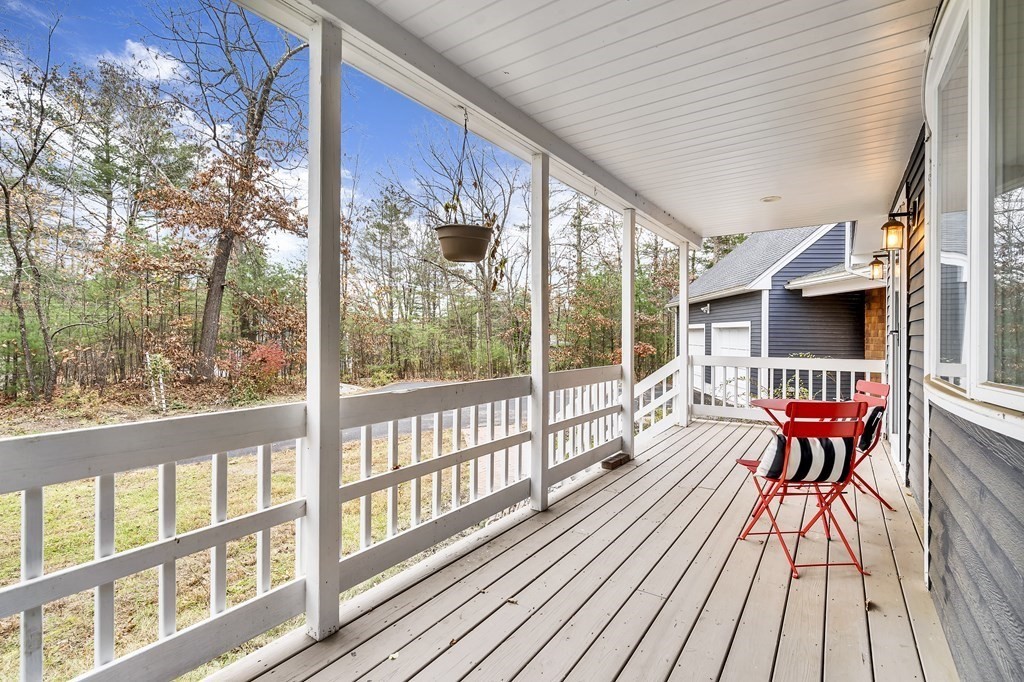 222 Middle Road Boxborough, MA 01719 - Photo 14 of 15 a balcony with furniture and wooden floor