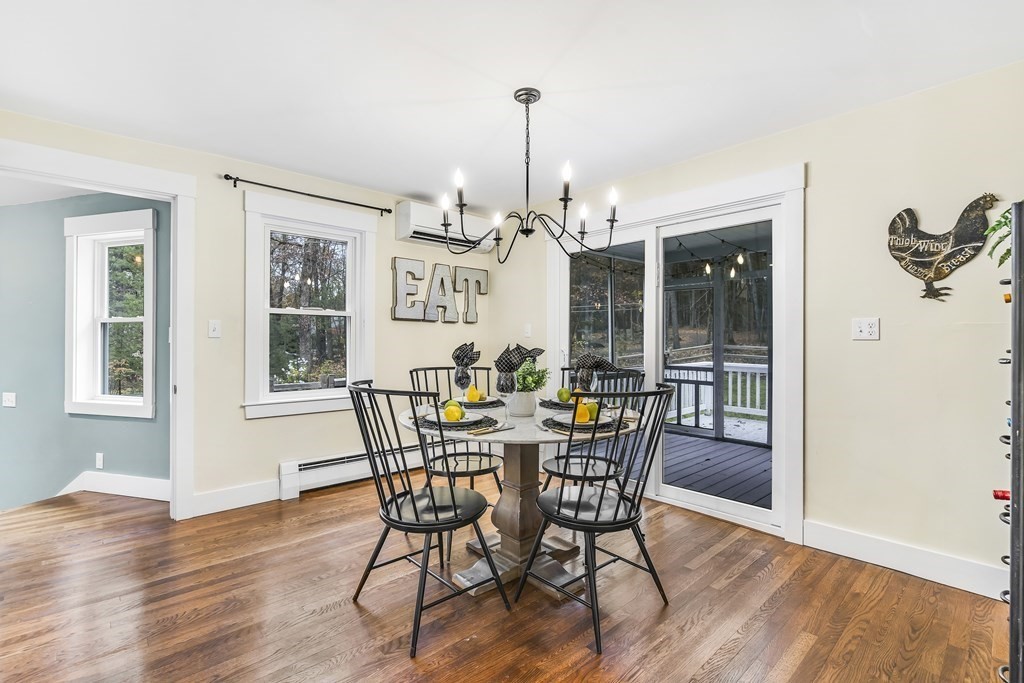 222 Middle Road Boxborough, MA 01719 - Photo 6 of 15 a view of a dining room with furniture window and wooden floor