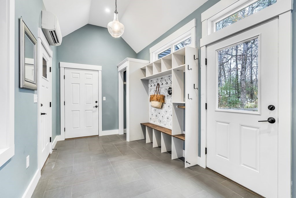 222 Middle Road Boxborough, MA 01719 - Photo 7 of 15 a view of livingroom with hardwood floor and hallway