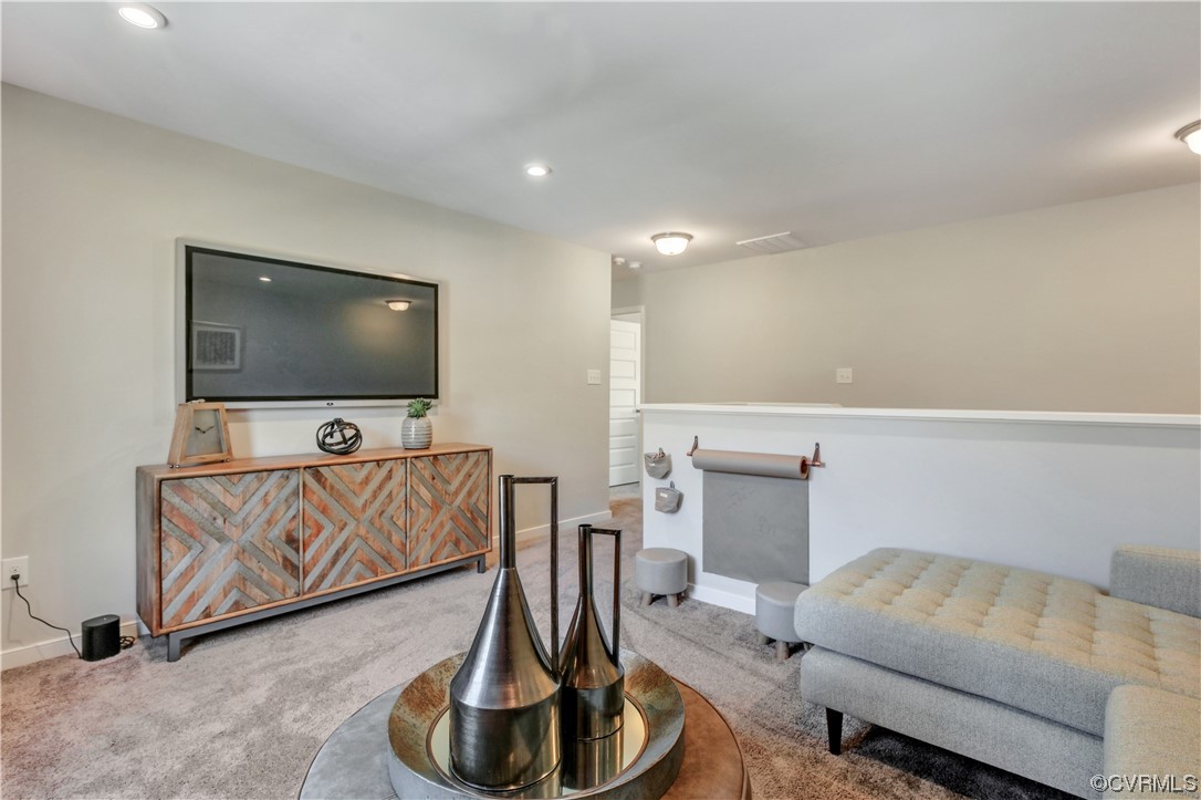 67 Chelsea Circle Aylett, VA 23009 - Photo 18 of 36 a living room with furniture and a flat screen tv