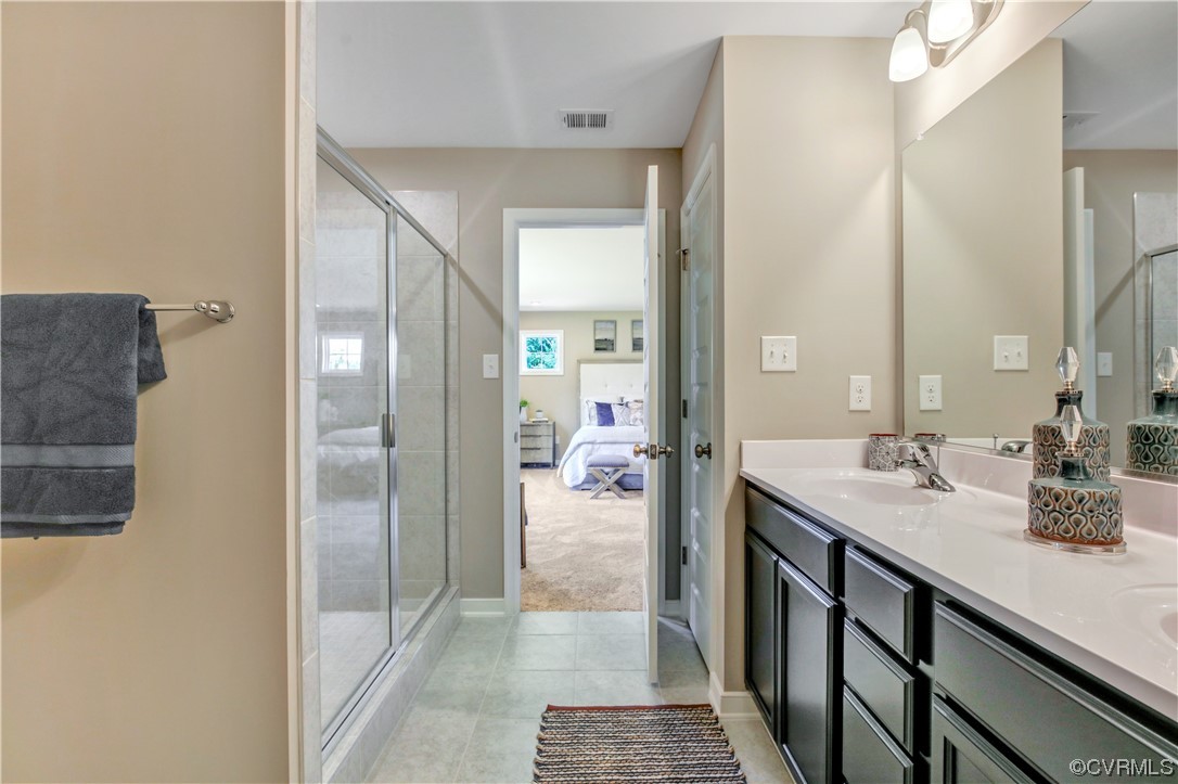 67 Chelsea Circle Aylett, VA 23009 - Photo 24 of 36 a bathroom with a sink and mirror