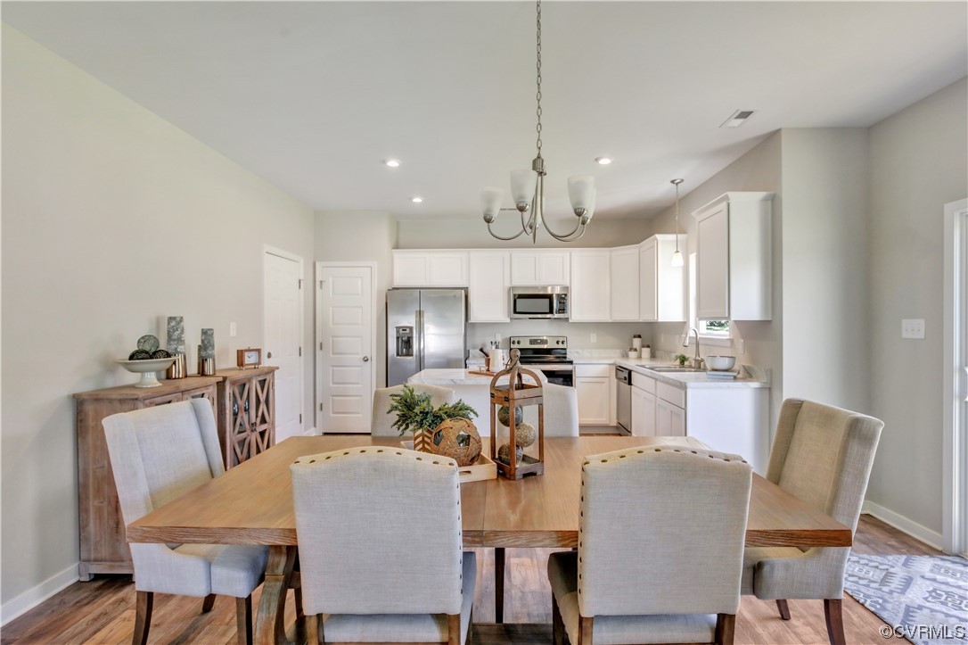 67 Chelsea Circle Aylett, VA 23009 - Photo 9 of 36 a view of a dining room with furniture