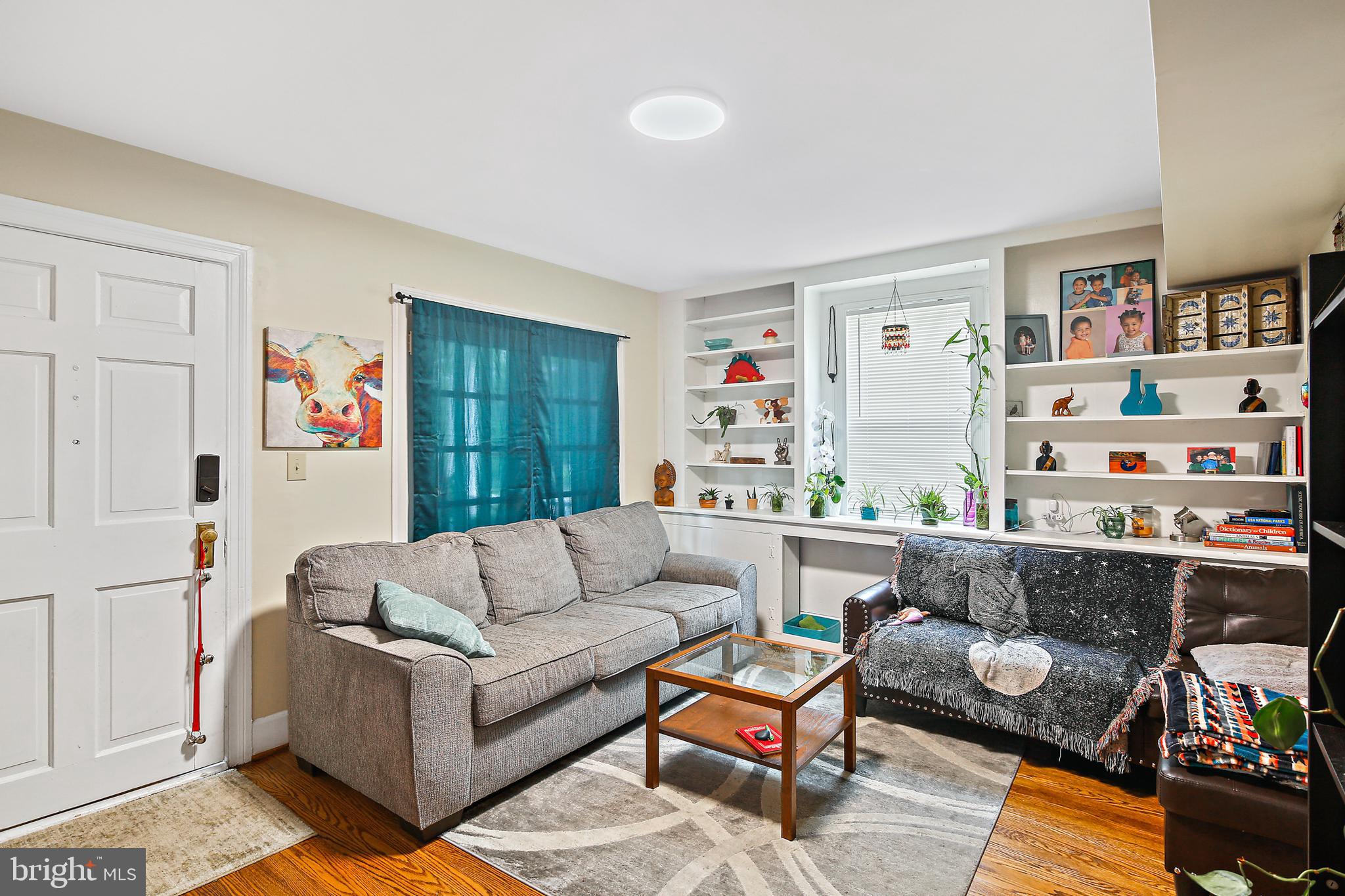 1250 Greystone Road Halethorpe, MD 21227 - Photo 3 of 39 Main Level Apt Living Room w/Hardwood Flooring