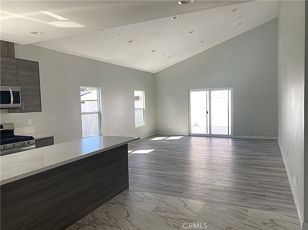 955 Brossard Drive Thousand Oaks, CA 91360 - Photo 3 of 19 a room with wooden floor and window