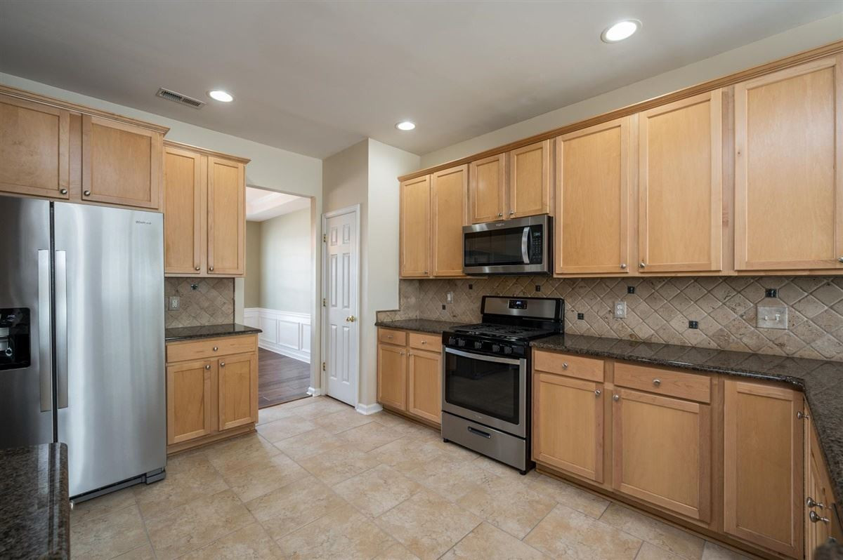 7439 Lagrange Drive Raleigh, NC 27613 - Photo 5 of 18 Gas stove top