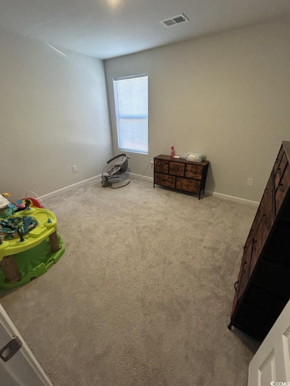 463 Ribbon Rail Way Loris, SC 29569 - Photo 10 of 27 Bedroom with carpet and baseboards