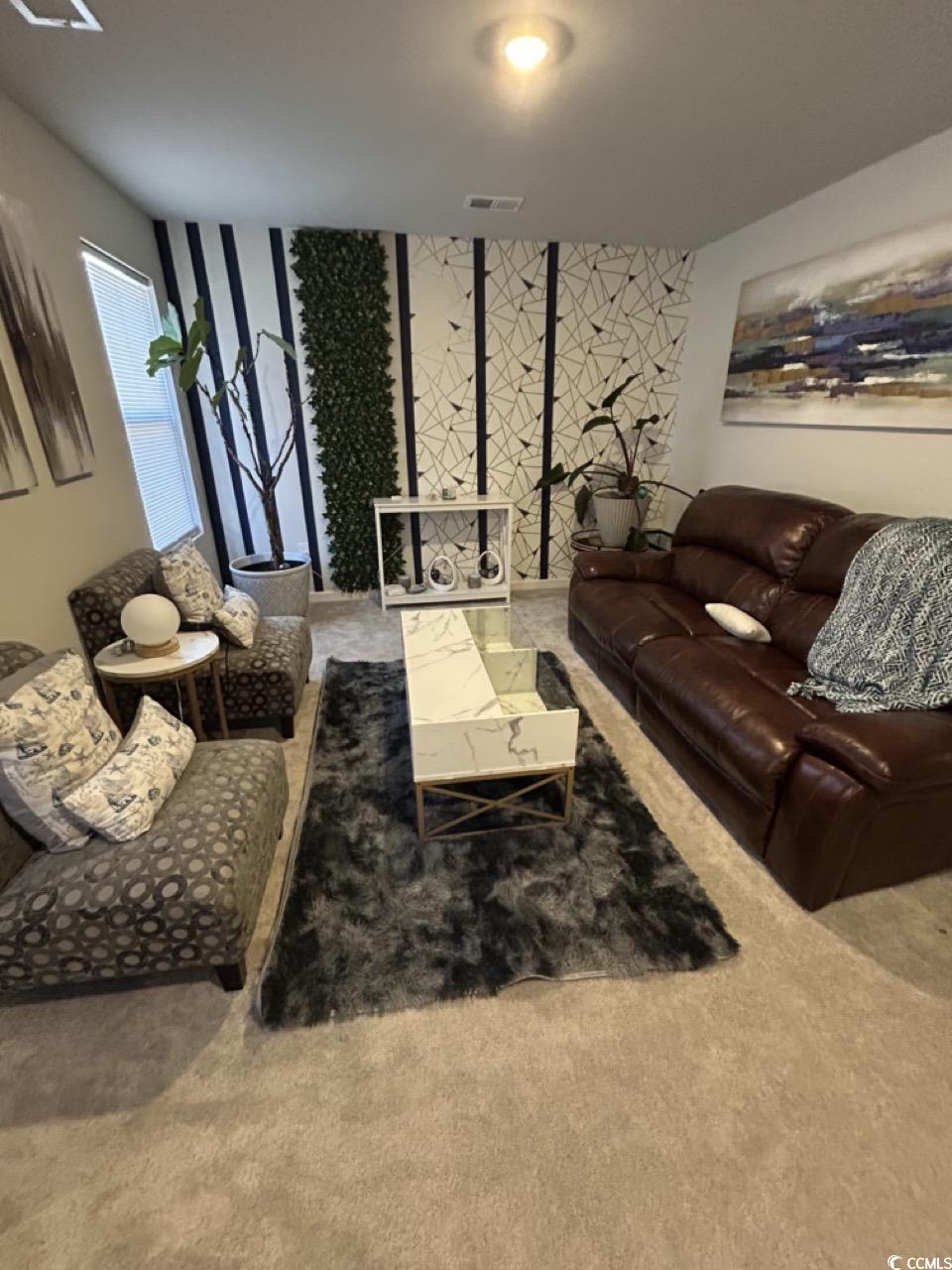 463 Ribbon Rail Way Loris, SC 29569 - Photo 16 of 27 Living area with light carpet