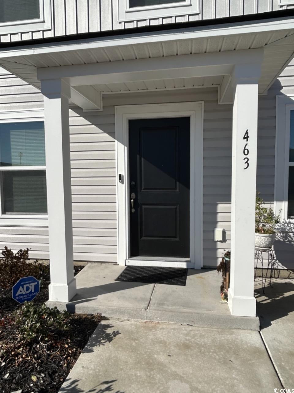 463 Ribbon Rail Way Loris, SC 29569 - Photo 2 of 27 Doorway to property with covered porch