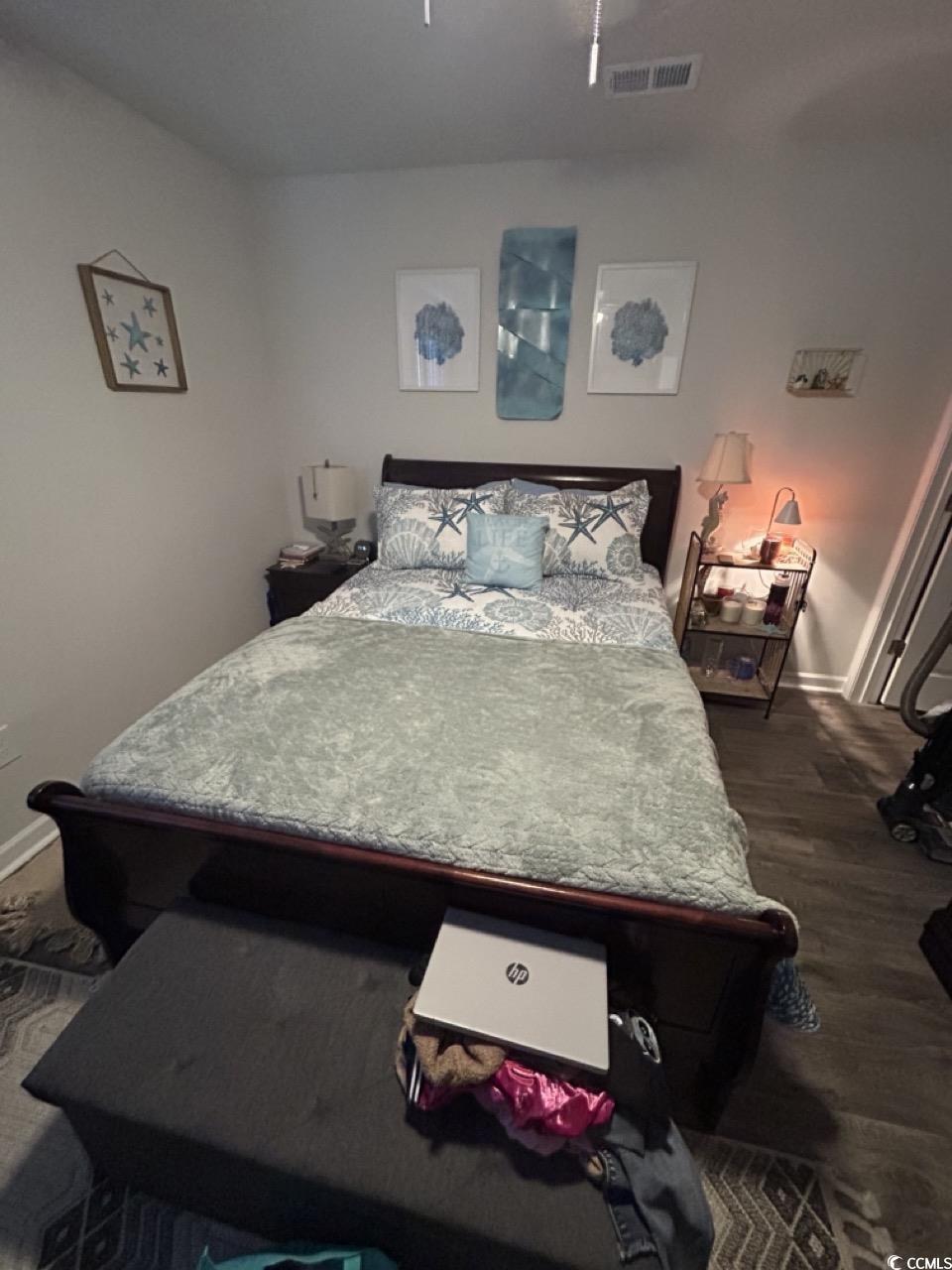 463 Ribbon Rail Way Loris, SC 29569 - Photo 5 of 27 Bedroom featuring ceiling fan and dark wood-style floors