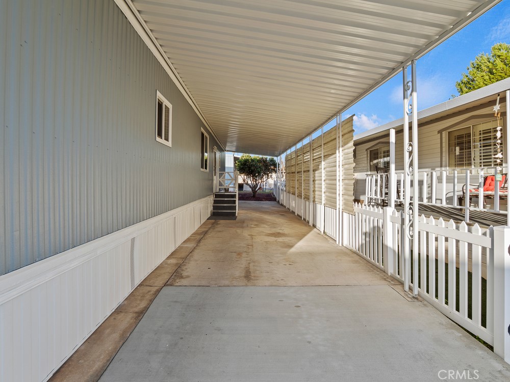 8301 Mission Gorge Road, Unit 172 Santee, CA 92071 - Photo 26 of 30 a view of a porch with wooden stairs