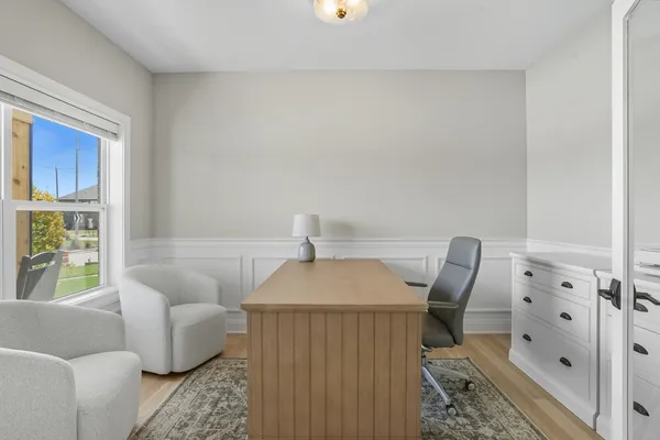 a utility room with sink dryer and washer
