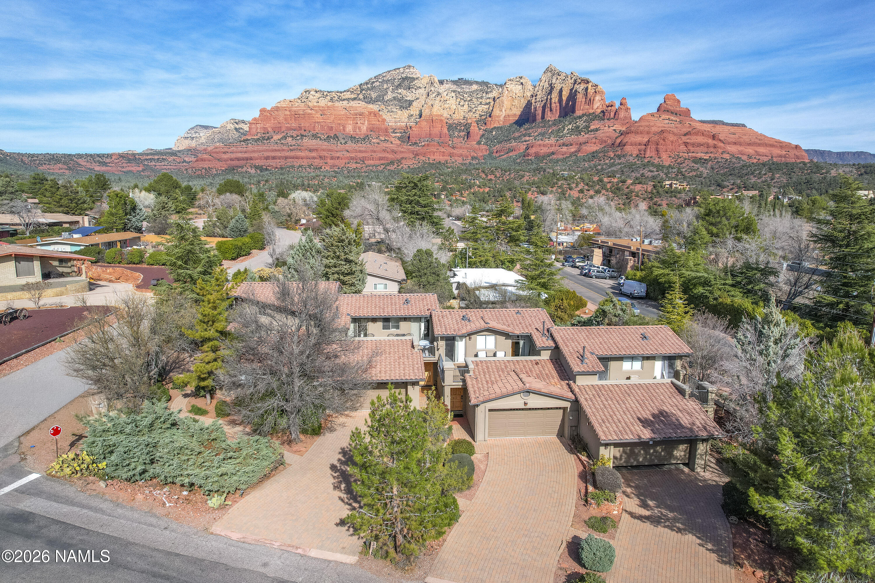 318 Capital Butte Road, Unit 2 Sedona, AZ 86336 - Photo 2 of 30 an aerial view of residential houses with outdoor space