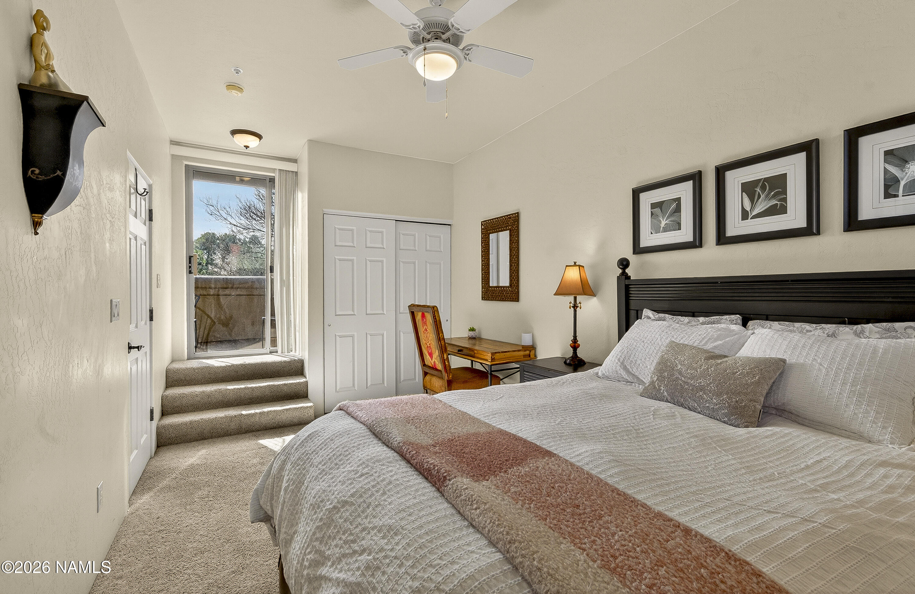 318 Capital Butte Road, Unit 2 Sedona, AZ 86336 - Photo 29 of 30 a bedroom with a large bed and a window
