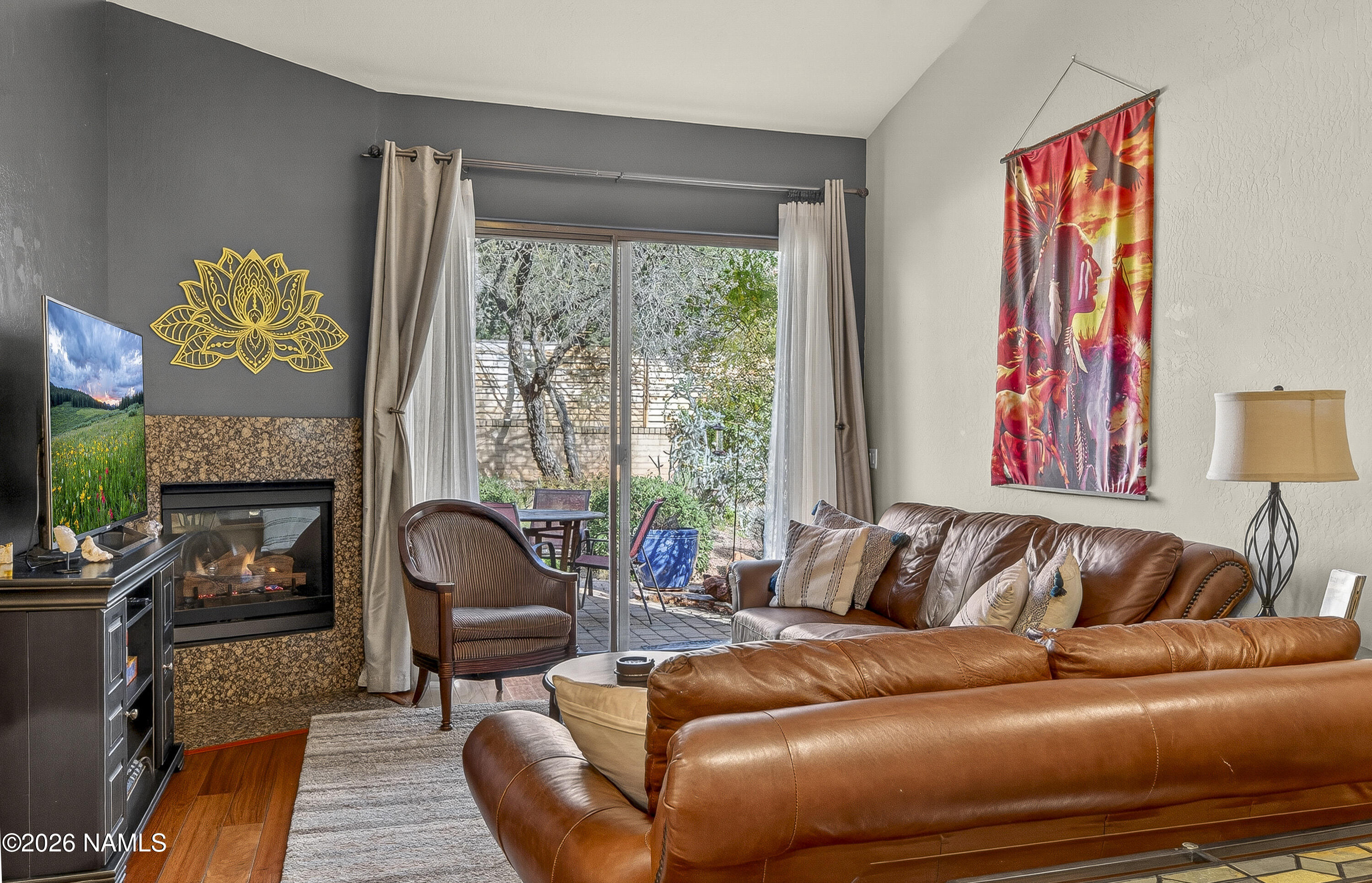 318 Capital Butte Road, Unit 2 Sedona, AZ 86336 - Photo 7 of 30 a living room with furniture and a large window
