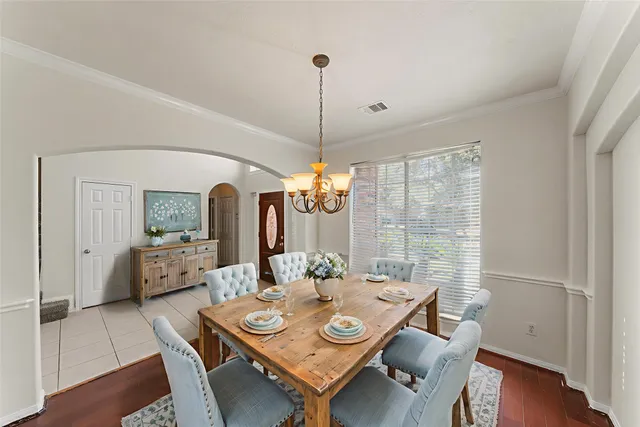 a kitchen with granite countertop a sink and cabinets