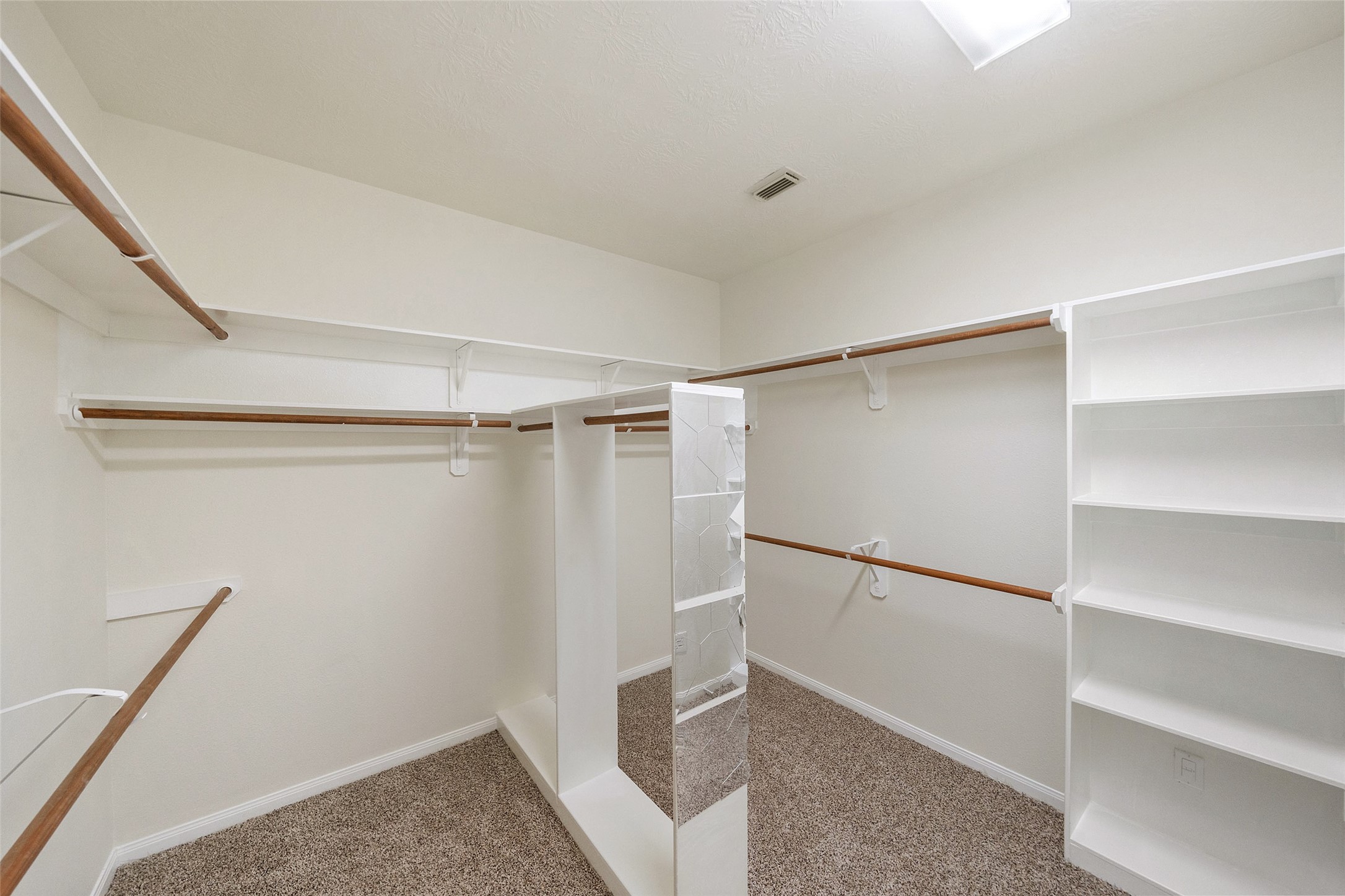 14213 Stone Bluff Lane Rosharon, TX 77583 - Photo 29 of 44 a view of an empty walk in closet