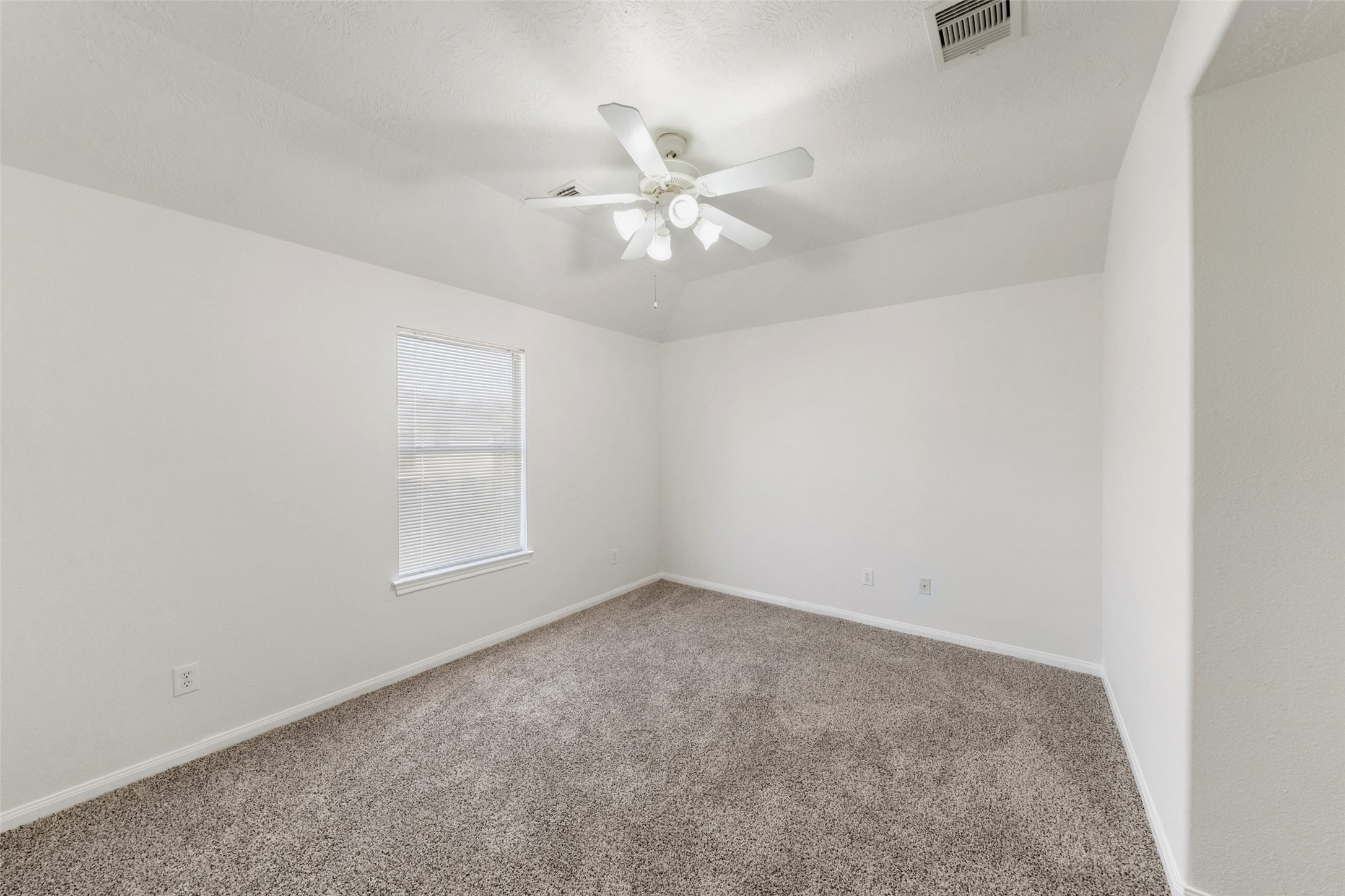 14213 Stone Bluff Lane Rosharon, TX 77583 - Photo 35 of 44 an empty room with a window and a fan