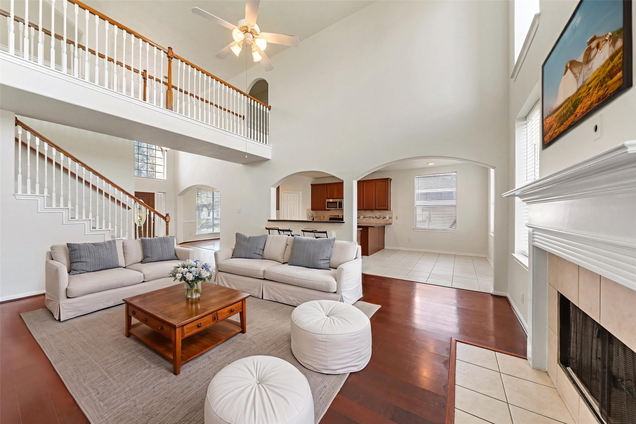 14213 Stone Bluff Lane Rosharon, TX 77583 - Photo 8 of 44 a living room with furniture a rug and a fireplace