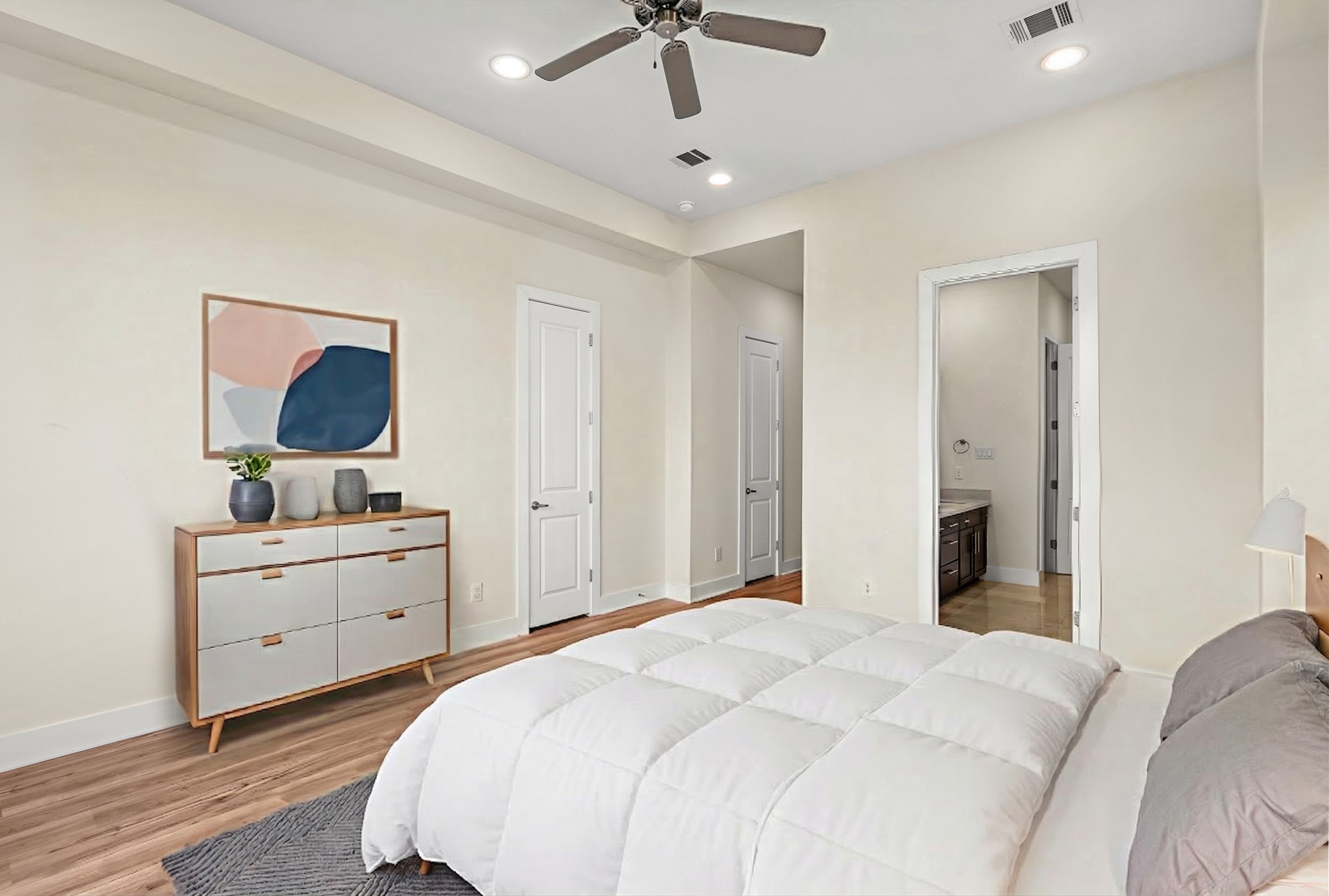 4409 Schuler Street, Unit A Houston, TX 77007 - Photo 21 of 33 Primary suite offers a spacious layout with an en-suite bathroom conveniently located on the side. **This room has been virtually staged.