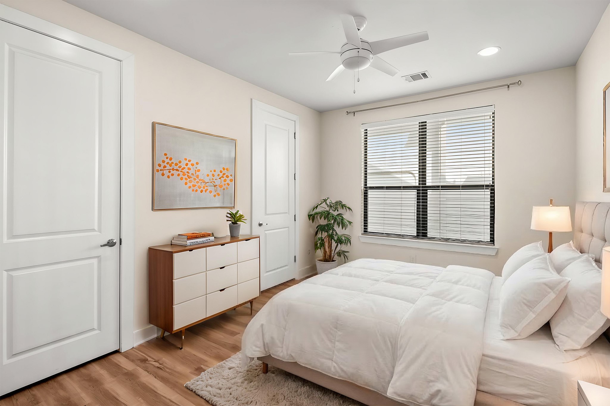 4409 Schuler Street, Unit A Houston, TX 77007 - Photo 28 of 33 Bedroom 2, located down the hall, includes a convenient walk-in closet.**This room has been virtually staged.