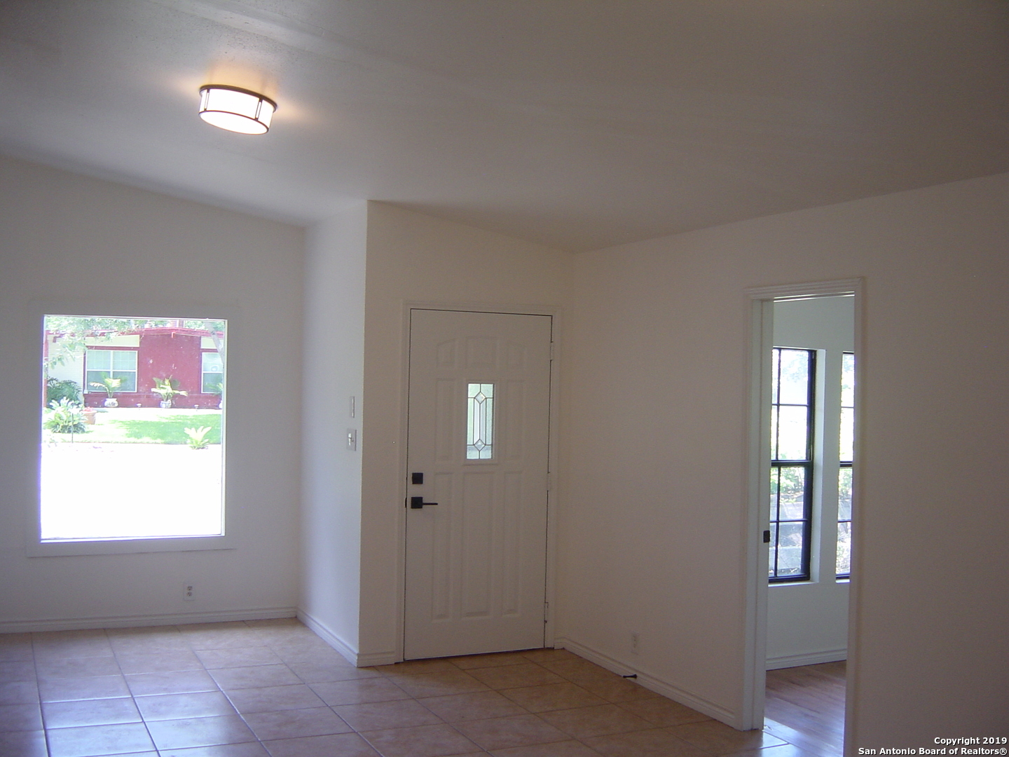 442 Sharon Drive San Antonio, TX 78216 - Photo 3 of 15 a view of an empty room with a window