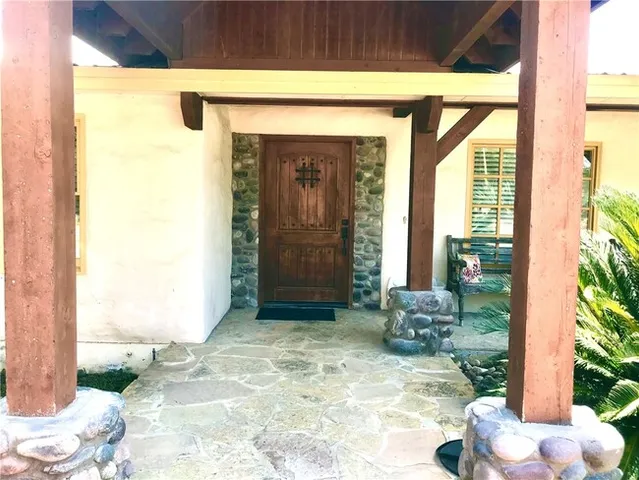 a view of a entryway door front of the house