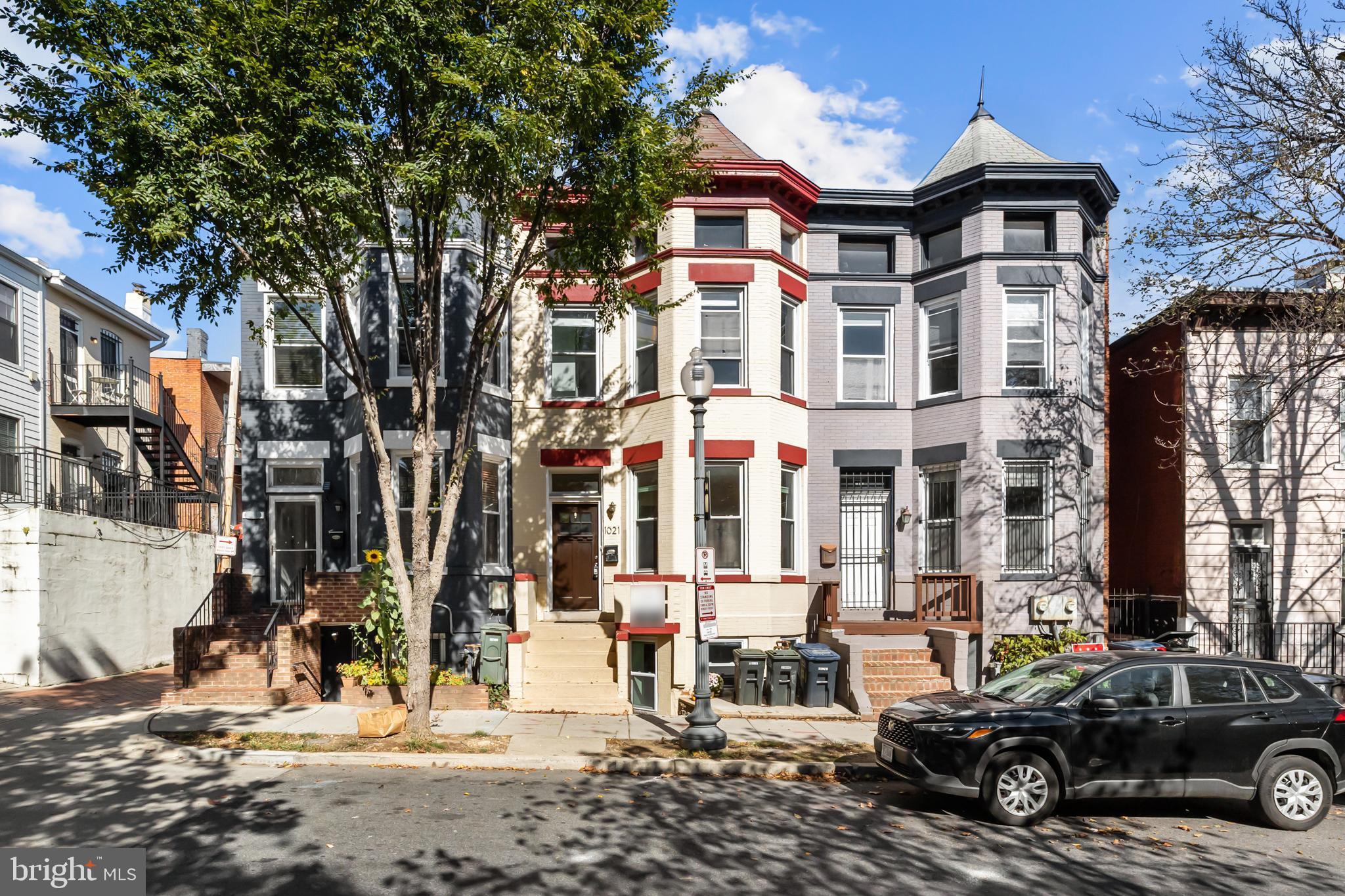 a car parked in front of a house