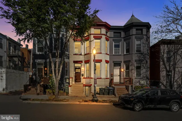 a car parked in front of a house