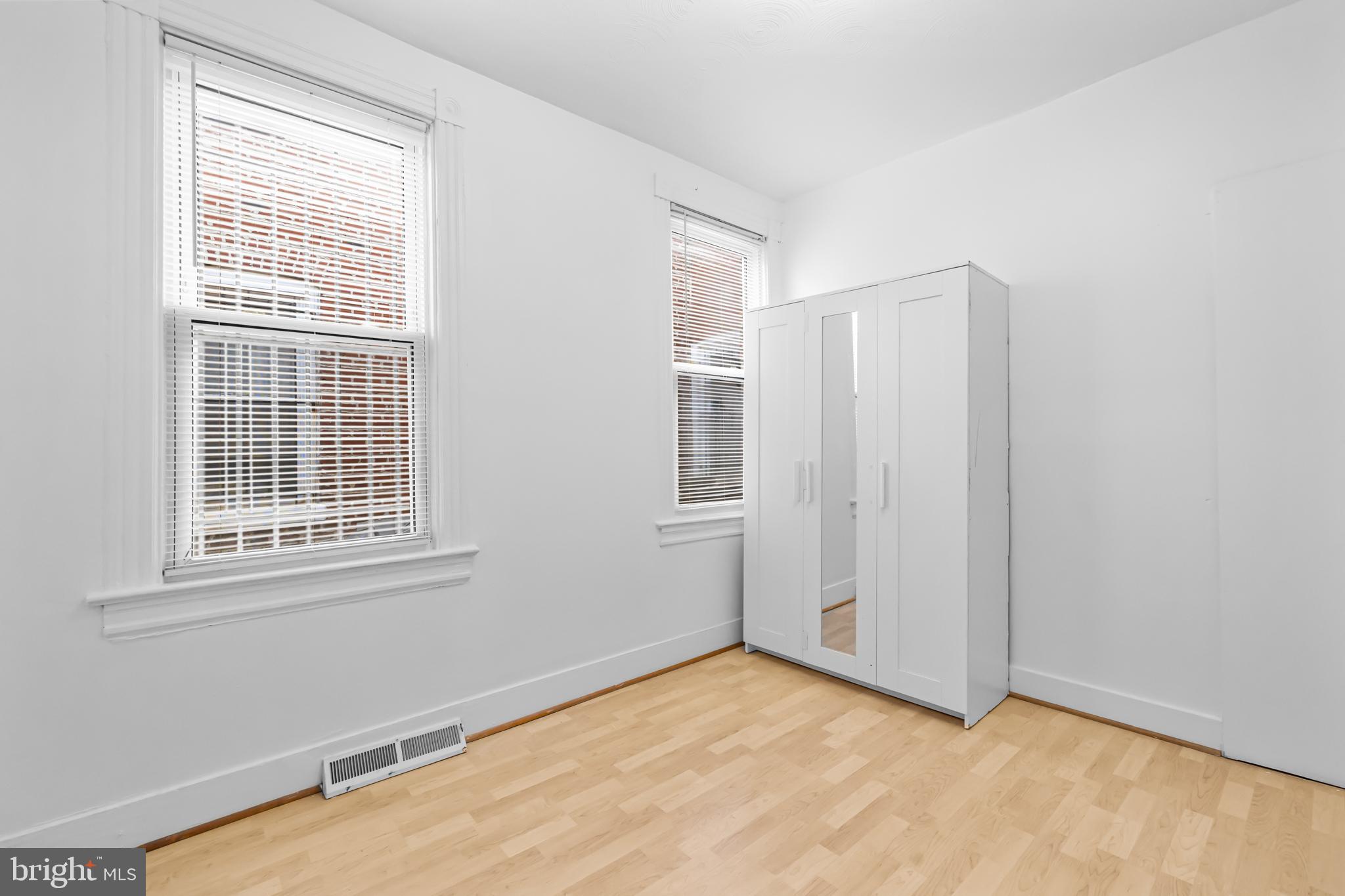 1021 Columbia Road Northwest Washington, DC 20001 - Photo 26 of 55 a view of an empty room with a window