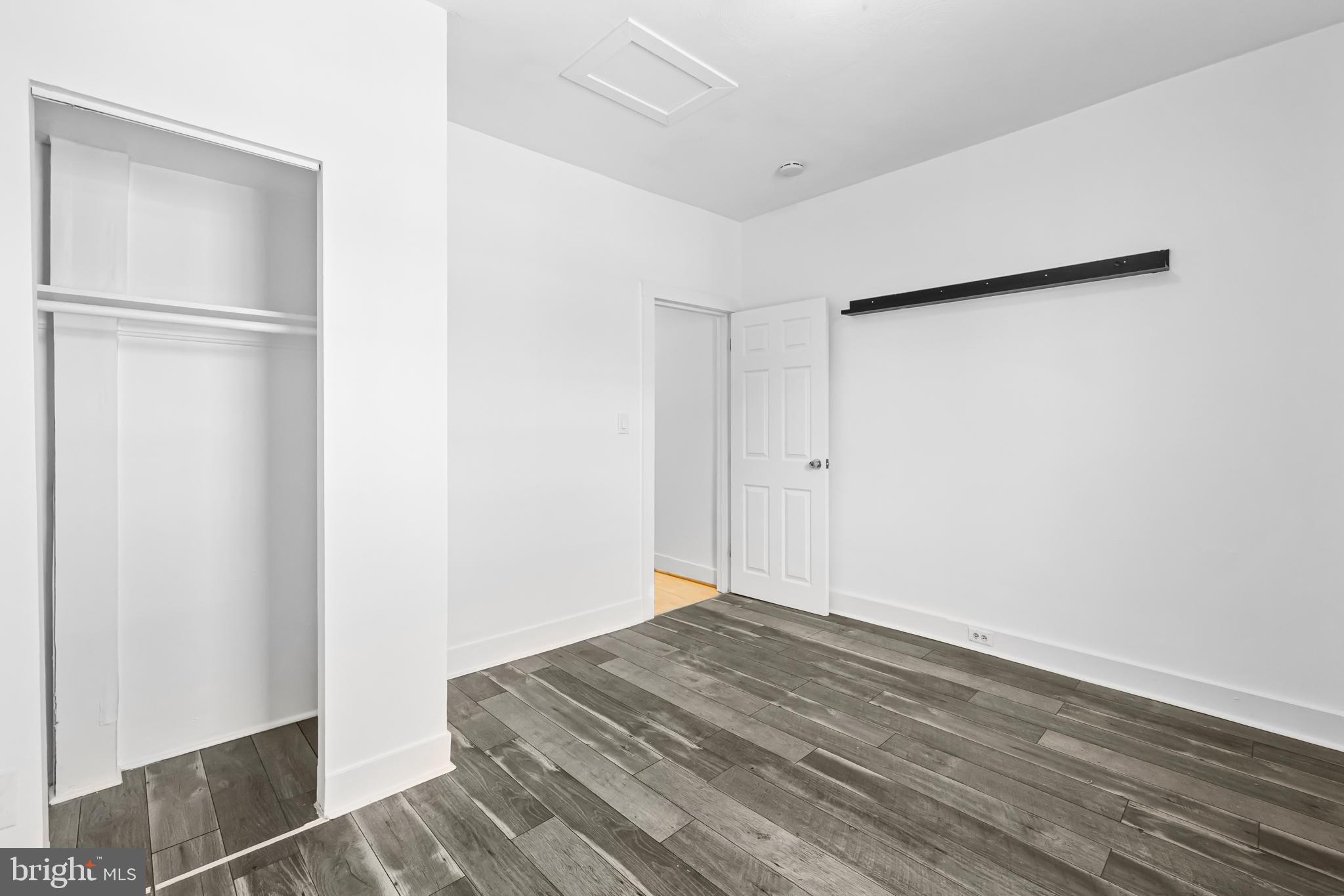 1021 Columbia Road Northwest Washington, DC 20001 - Photo 28 of 55 a view of a room with wooden floor