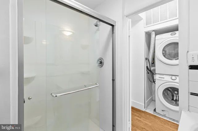 a kitchen with stainless steel appliances a stove a sink and a refrigerator