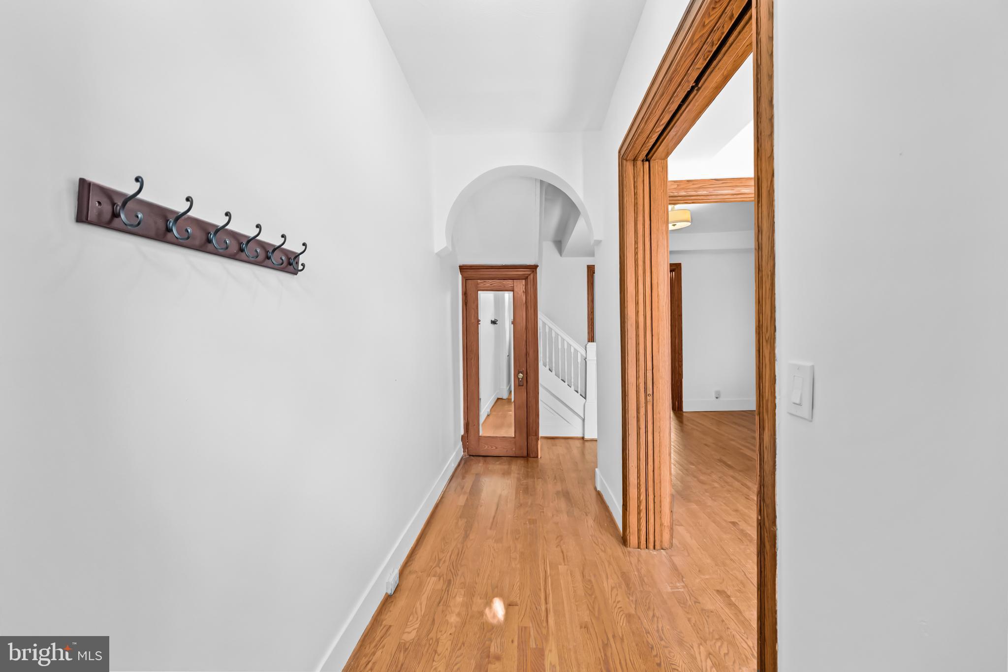 1021 Columbia Road Northwest Washington, DC 20001 - Photo 3 of 55 a view of a room with wooden floor