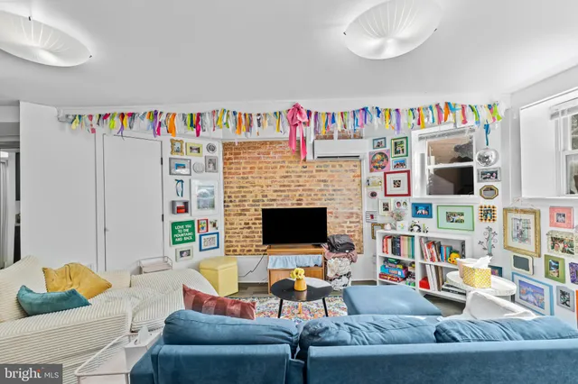 a view of a bathroom with a washer and dryer
