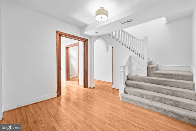 a view of entryway with wooden floor