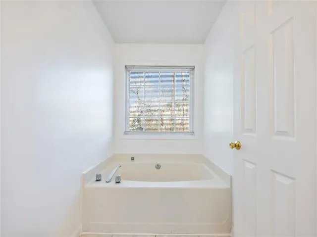 a bathroom with a bathtub