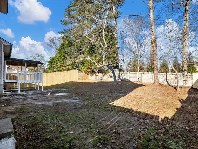 a view of yard with tree s