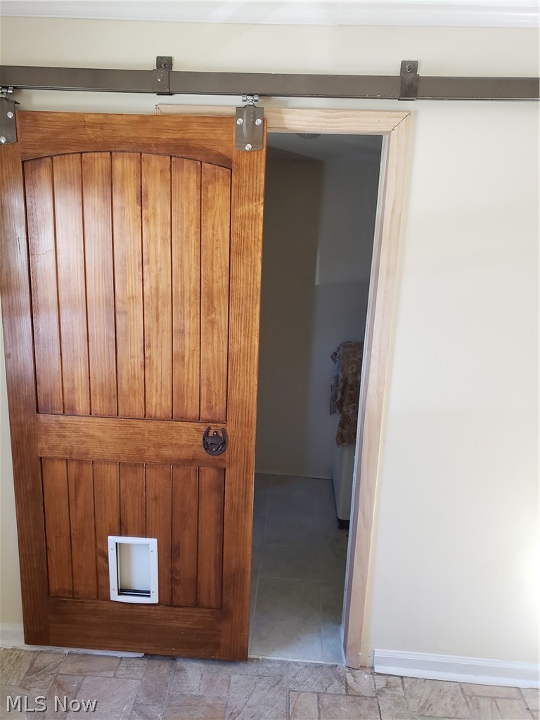 4132 Ruth Drive Rootstown, OH 44272 - Photo 7 of 33 Barn door to laundry area