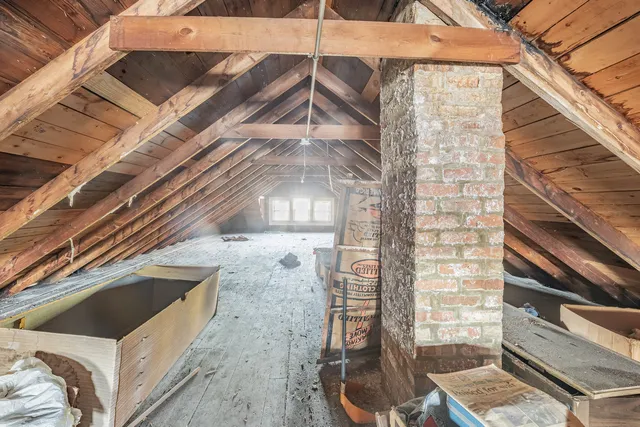 a view of a balcony with wooden floor