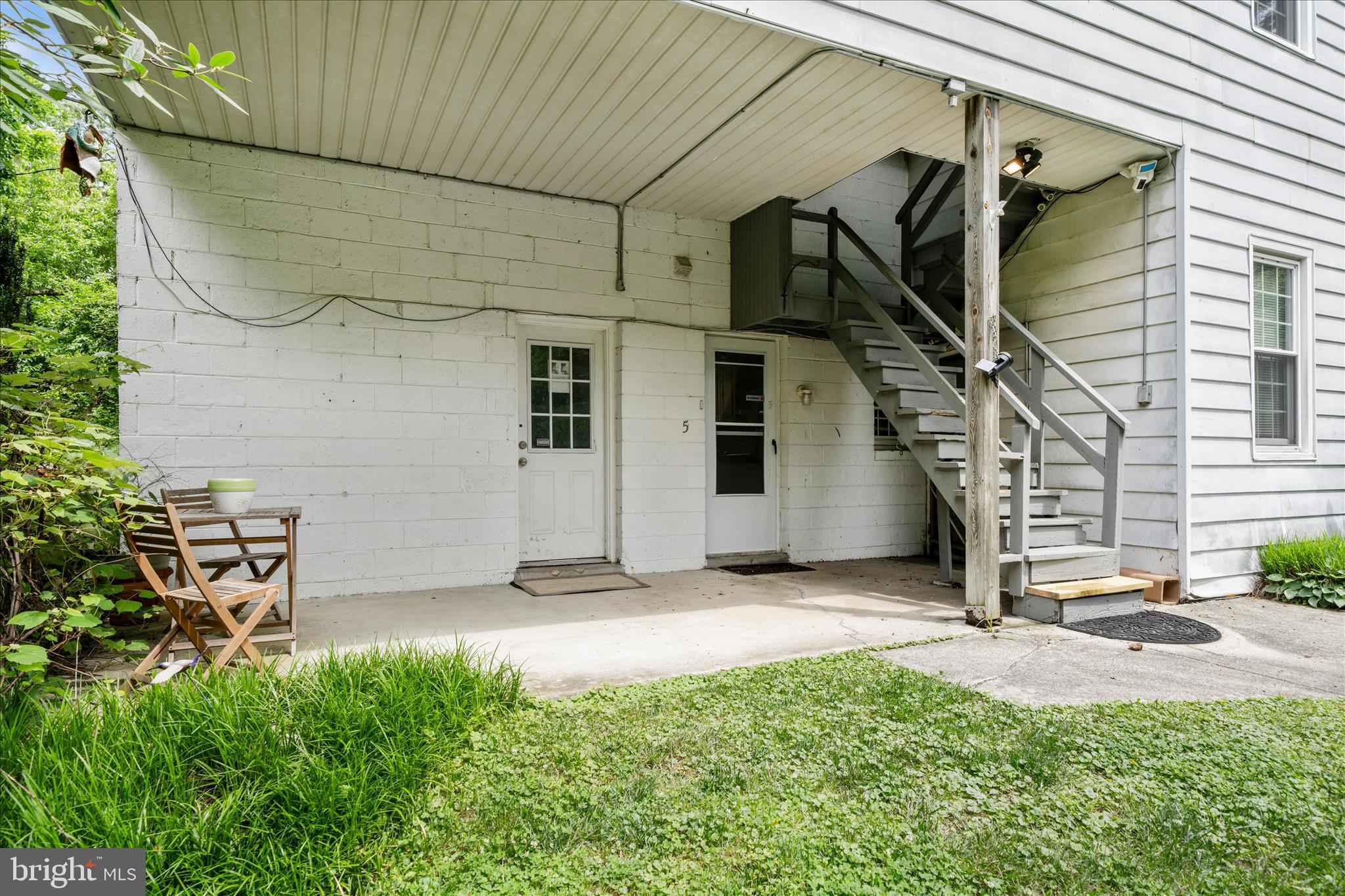 25930 Ridge Road Damascus, MD 20872 - Photo 52 of 62 Exterior Back - Door to Unit 5 on right