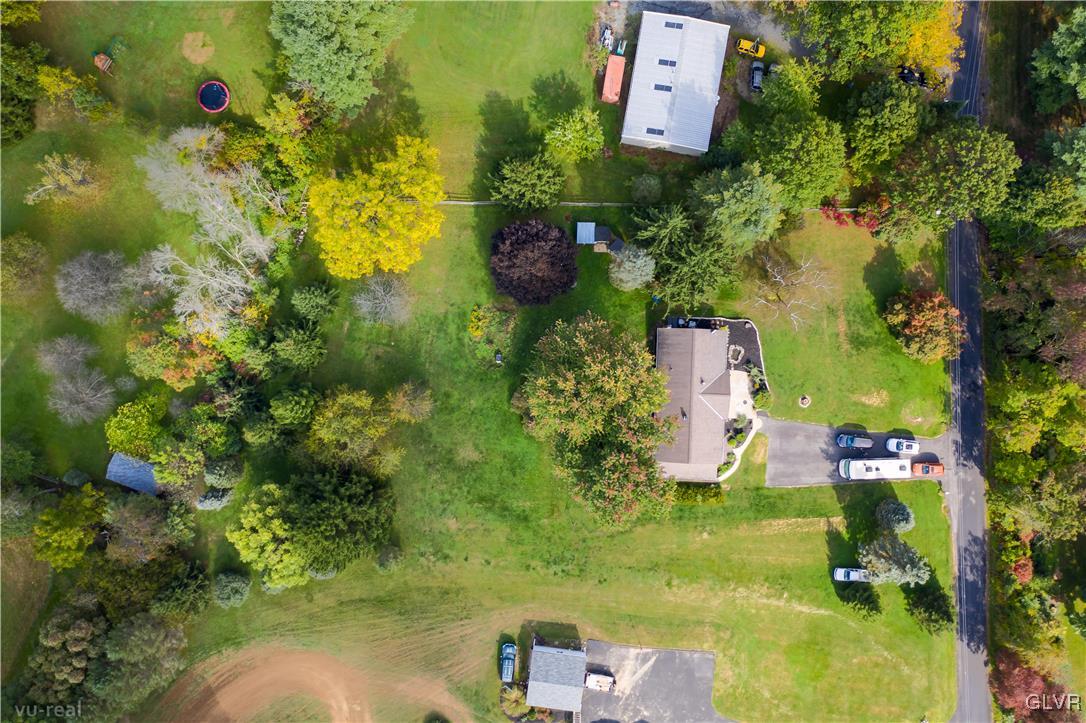 130 County Line Road Riegelsville, PA 18077 - Photo 11 of 40 an aerial view of residential house with outdoor space and swimming pool